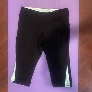 Old Navy Black and light aqua colored capri pants.